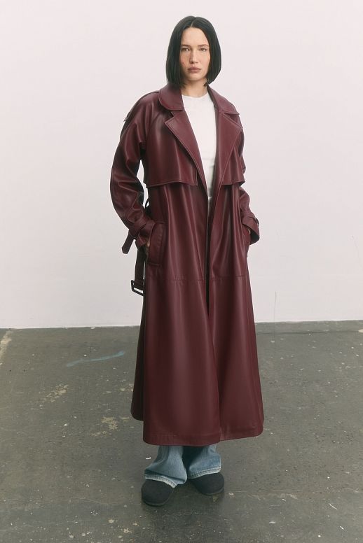 Burgundy eco-leather trench coat on suede